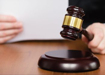 Tribunal de La Vega impone 30 años de cárcel a dos hombres por homicidio cometido en taller de motocicletas
