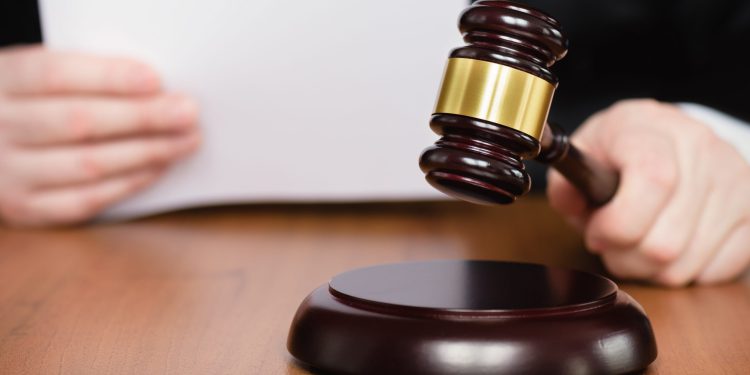 Tribunal de La Vega impone 30 años de cárcel a dos hombres por homicidio cometido en taller de motocicletas
